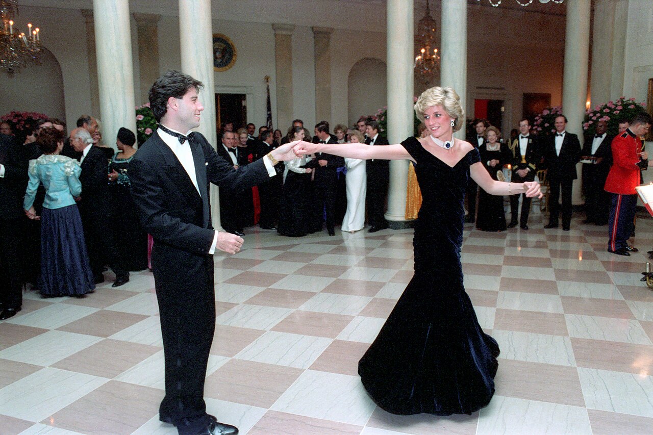Diana, Princess of Wales, dancing in a midnight-blue velvet gown at the White House, 1985.